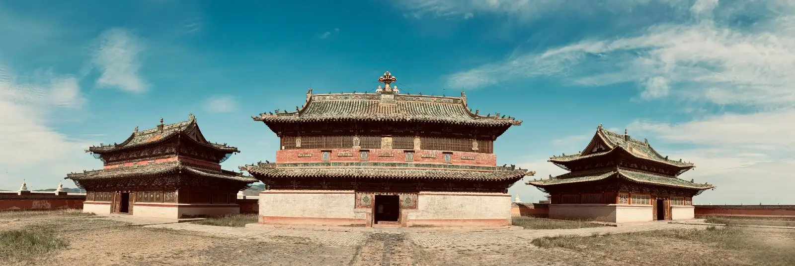The temples of Erdene Zuu monastery at Karakorum under a wide blue sky