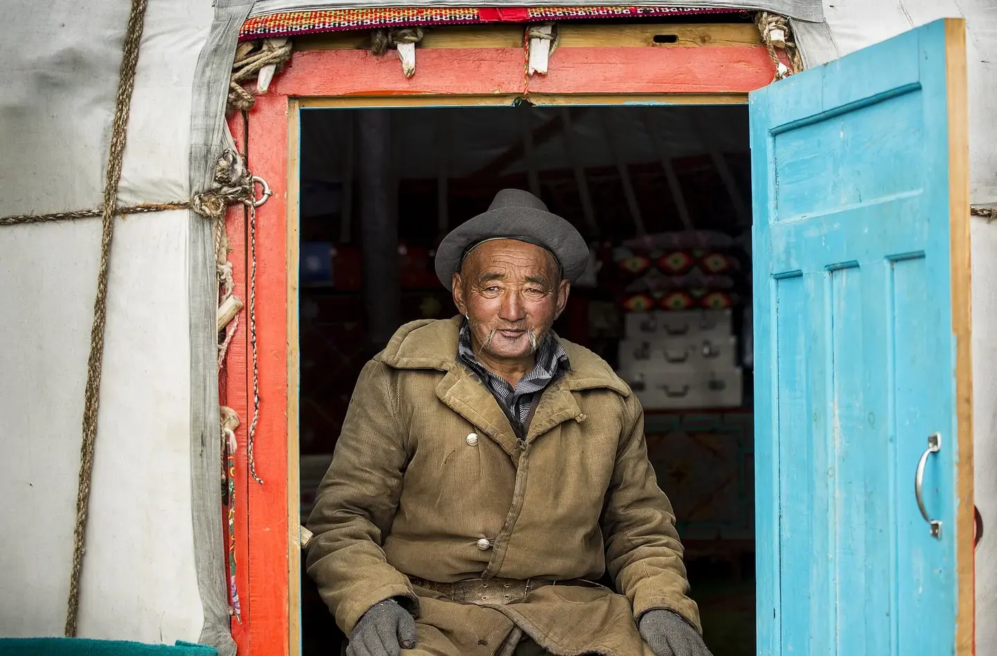 A Kazakh man in front of the Altai mountains